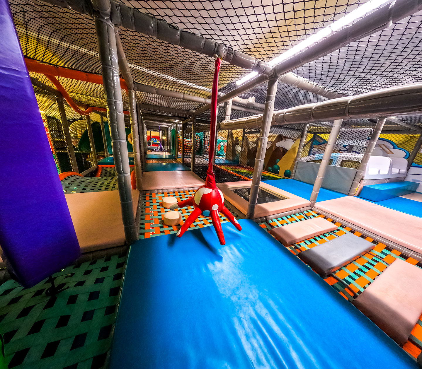 Netted obstacle-style play area inside Zebra World.