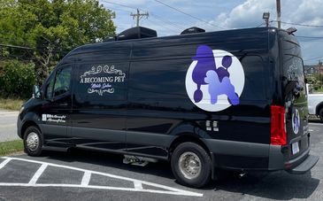 A Becoming Pet Salon mobile spa van exterior