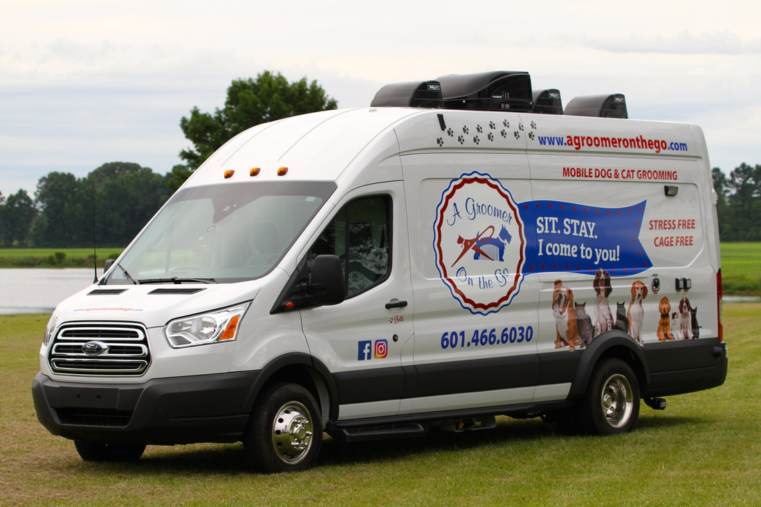 A Groomer On the Go mobile grooming van