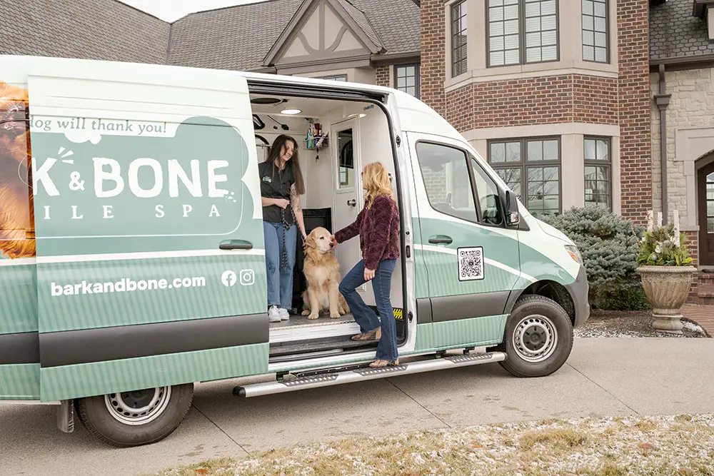 Mobile dog groomer arriving at a home in Indiana