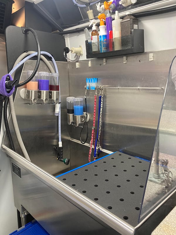 Bathing platform and tub inside the mobile grooming van