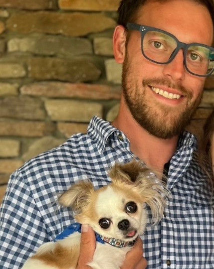 Lead groomer Travis H at DapperTails Greensboro