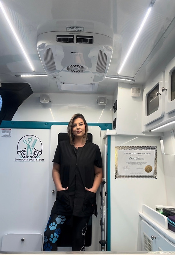 Owner-groomer portrait for Mutty Pawz Grooming.