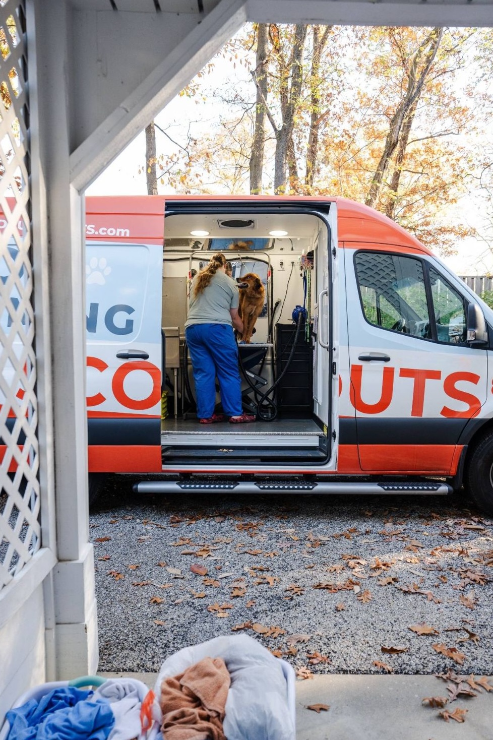 Pup Scouts mobile grooming van at a Charlotte home