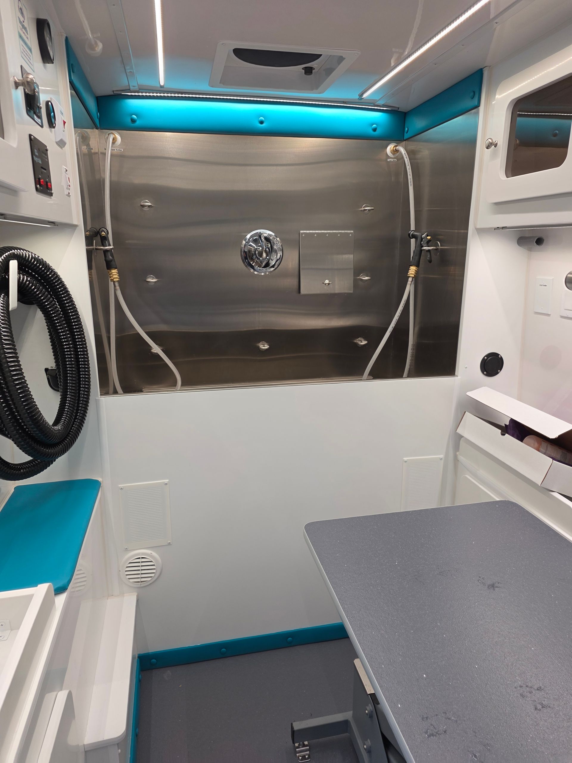 Interior of Sandy's Pet Spa mobile grooming van