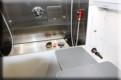 Hydro massage bathing setup used by Sniffs & Wiggles Mobile Grooming