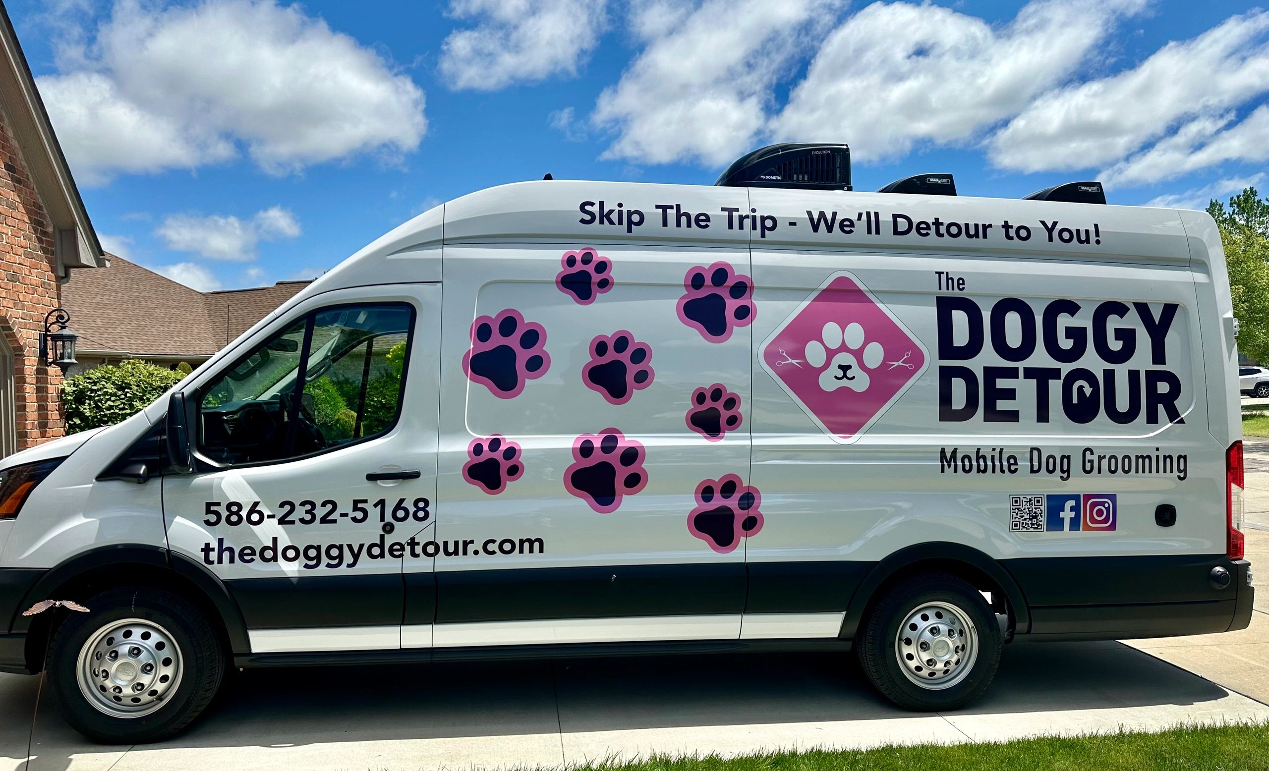 The Doggy Detour branded mobile grooming van