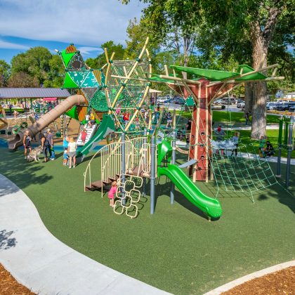 Children playing on the inclusive playground at Berthoud Town Park.
