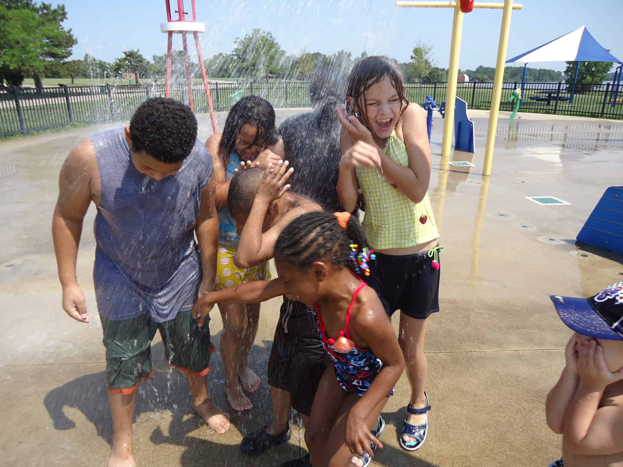 Ground-level view of the Bluebell Beach splash pad spray area.