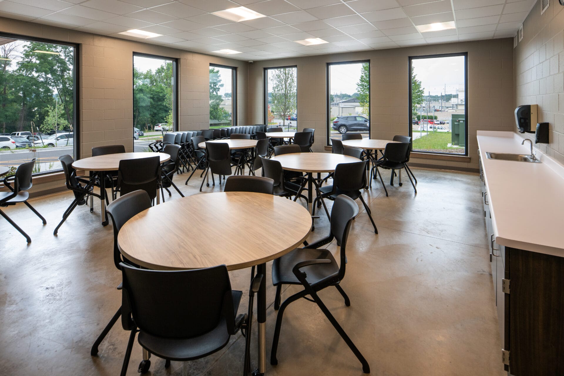 Shade structures and picnic tables at the City of Kaukauna Aquatic Center.