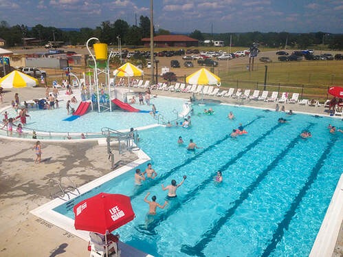 Aerial-style view of Clarksville Aquatic Center outdoor water park.