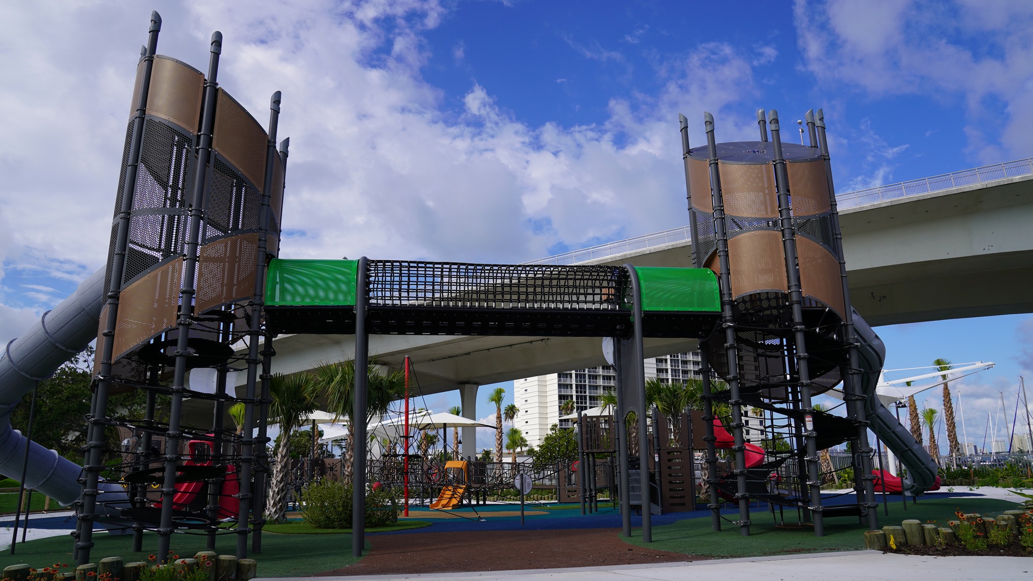 Tall pirate-themed playground towers at Coachman Park.