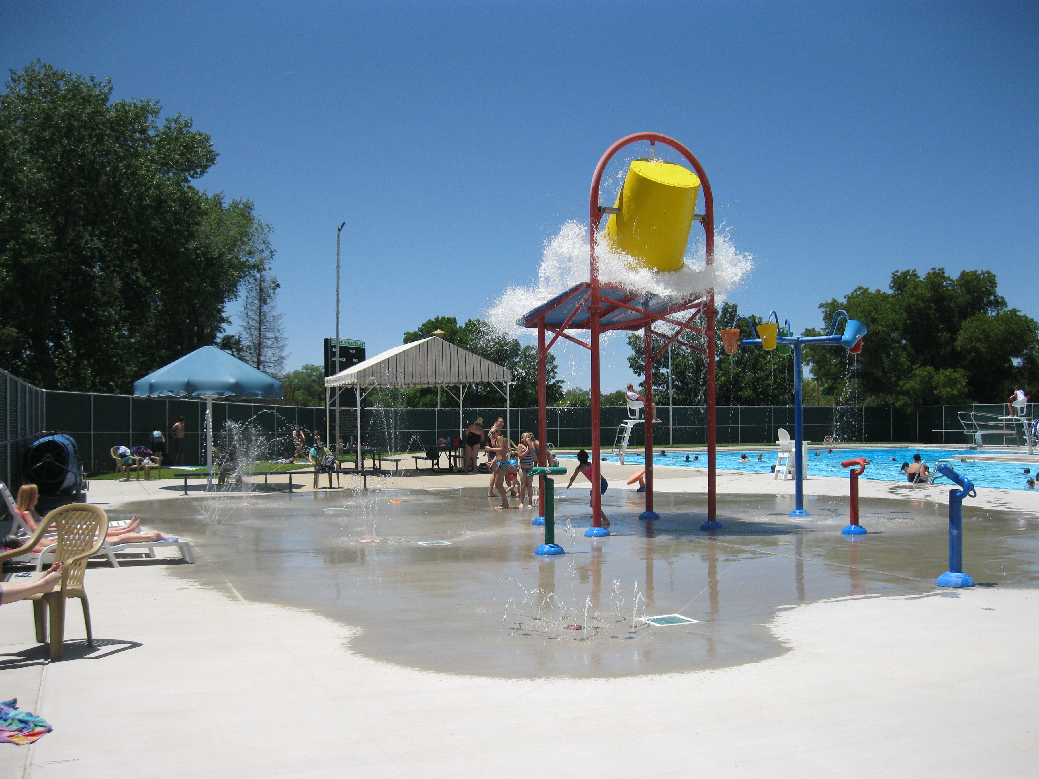 Outdoor pool splash pad area in Cortez.