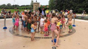Children playing in the Founders Square splash pad.