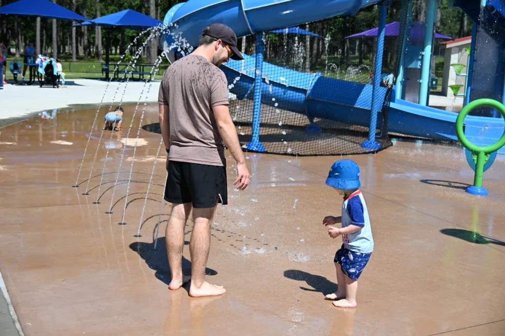 Children playing in spray features at Funland Splash Pad.