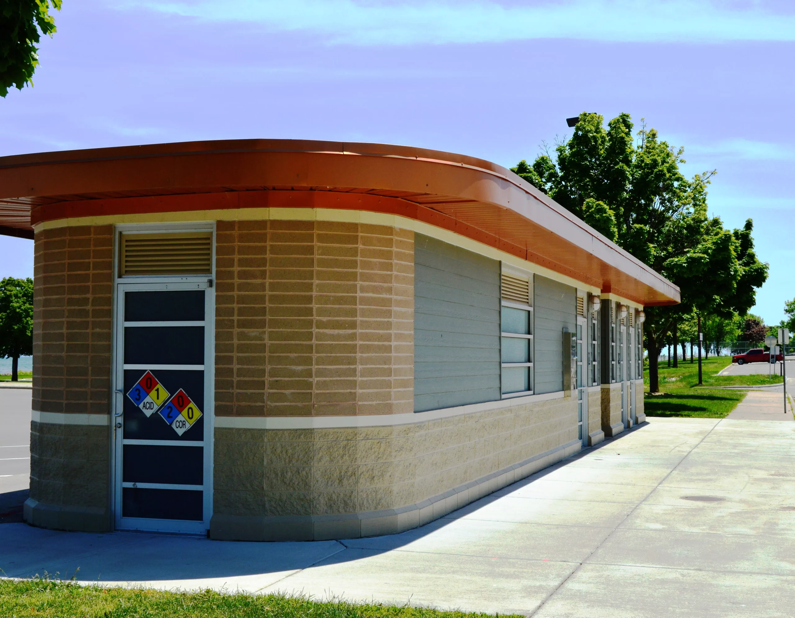Bath house building near the Laurel Clark Fountain splash pad.