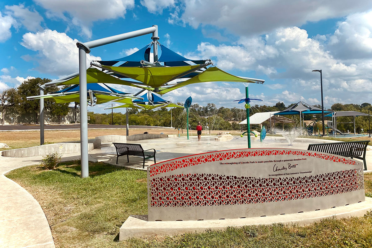 Covered bench and open water feature area at Lincoln Park.