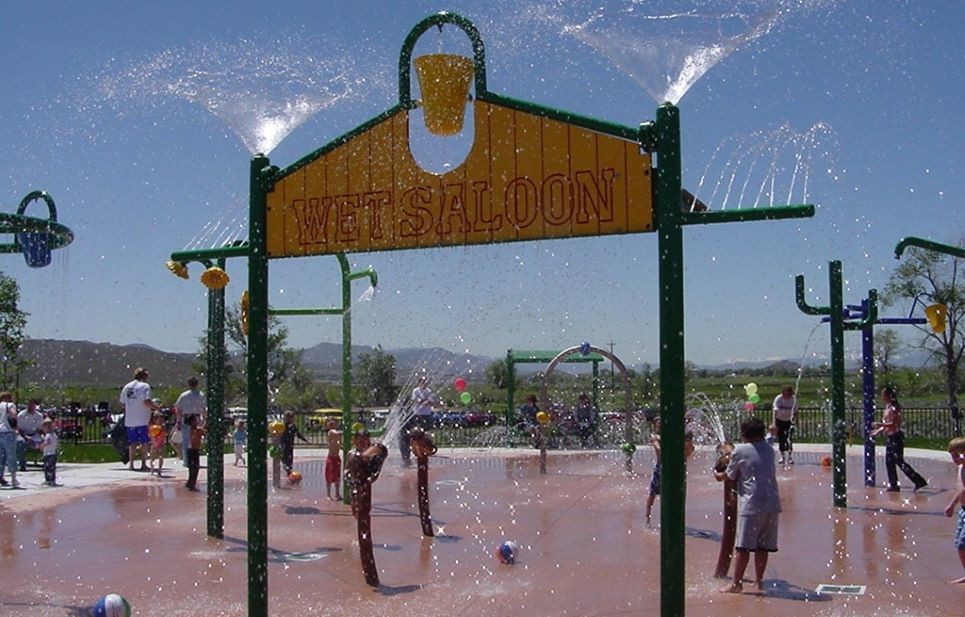 Bucket sprayer feature at Melio Gaspari Splash Park.