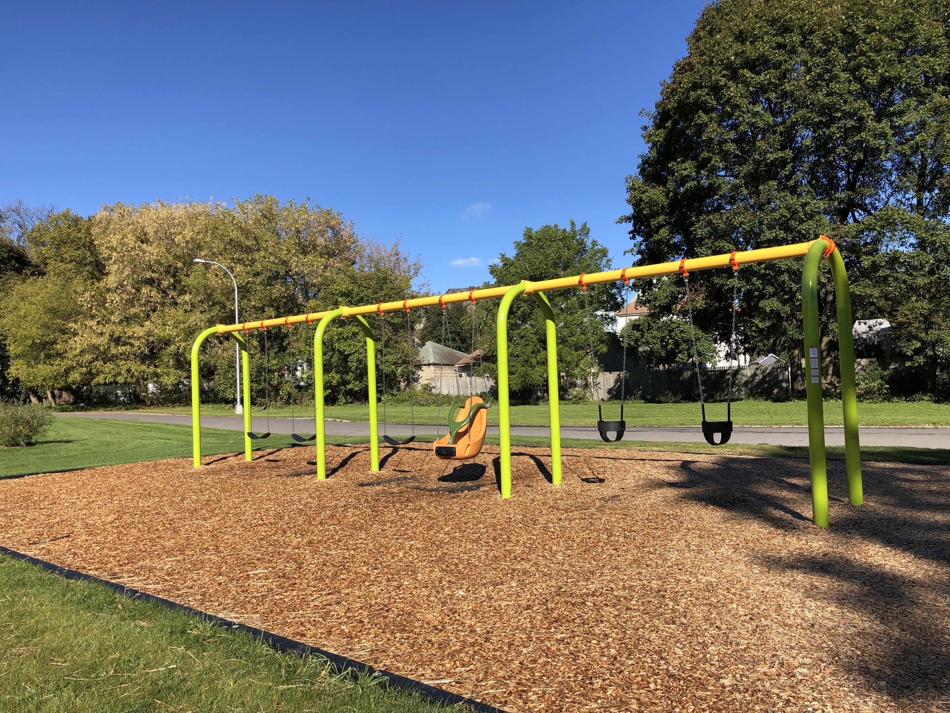 Swings and playground at Lower Onondaga Park.