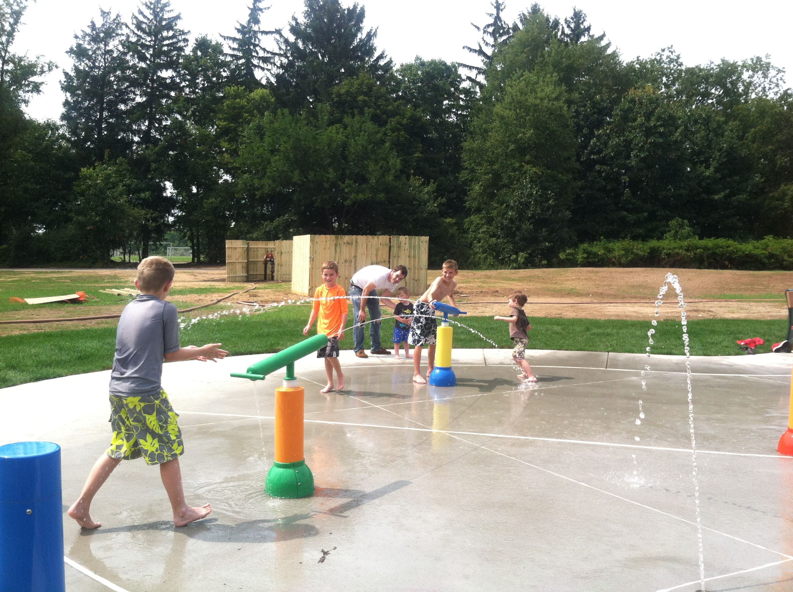 Kids playing on the River Oaks splash pad.