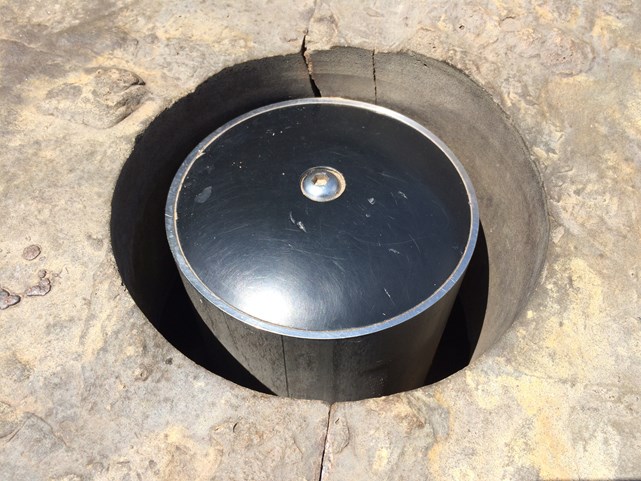 Black activation bollard used to start the Little Rock splash pads.