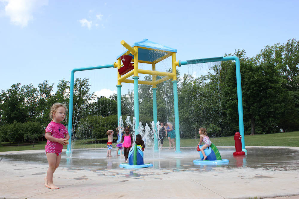 Children using the splash features at Riverside Park Sprayground.