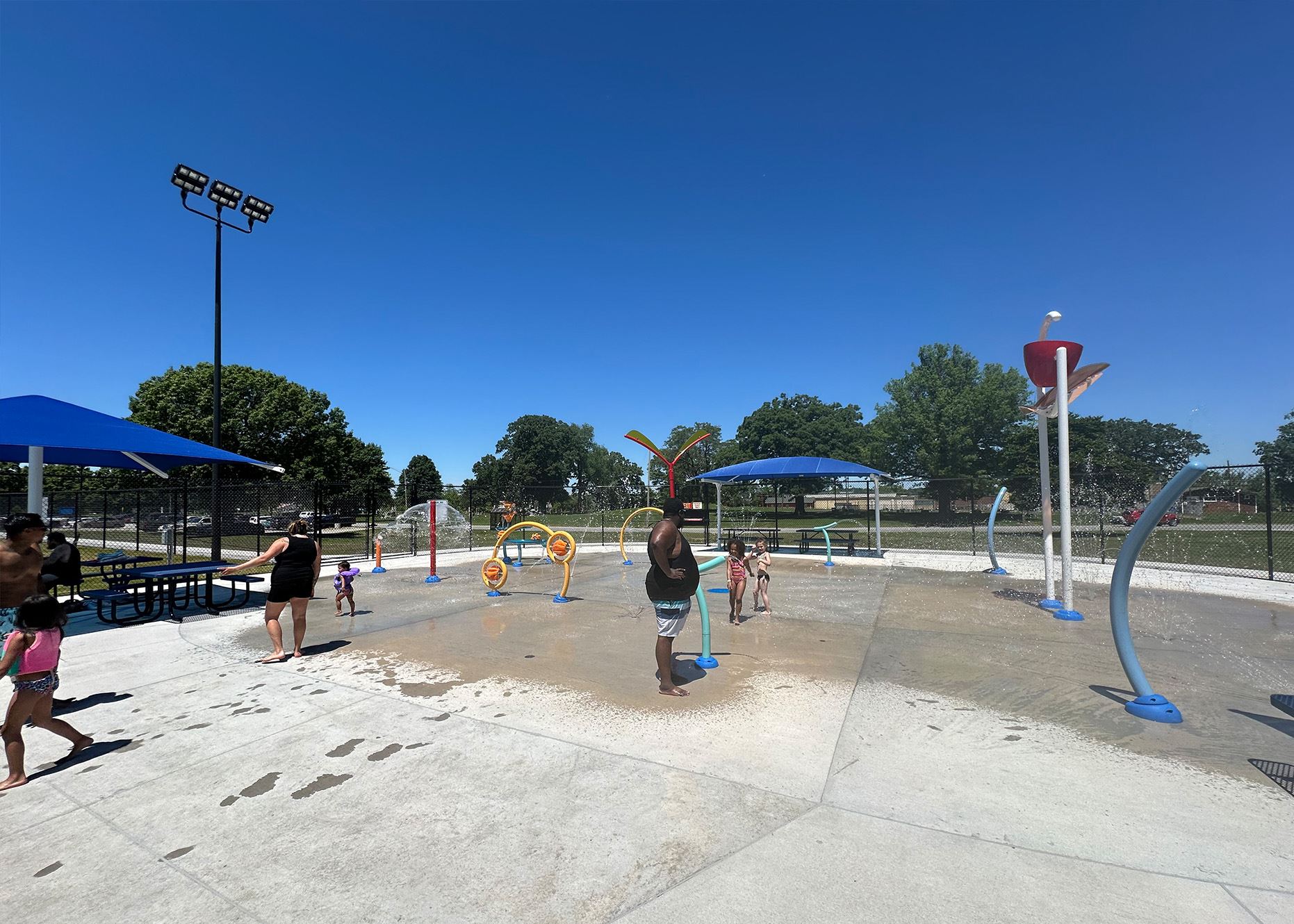 Splash pad spray features at Riverside Riverslide in Moline.