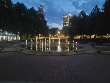 Splasheville interactive splash pad in downtown Asheville at night.