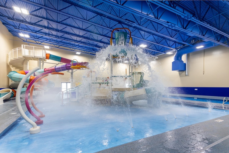 Tipping bucket over the splash area at The Alaska Club South.