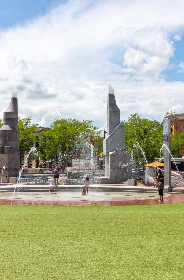 Grass and splash patio setting at Main Street Square in Rapid City.