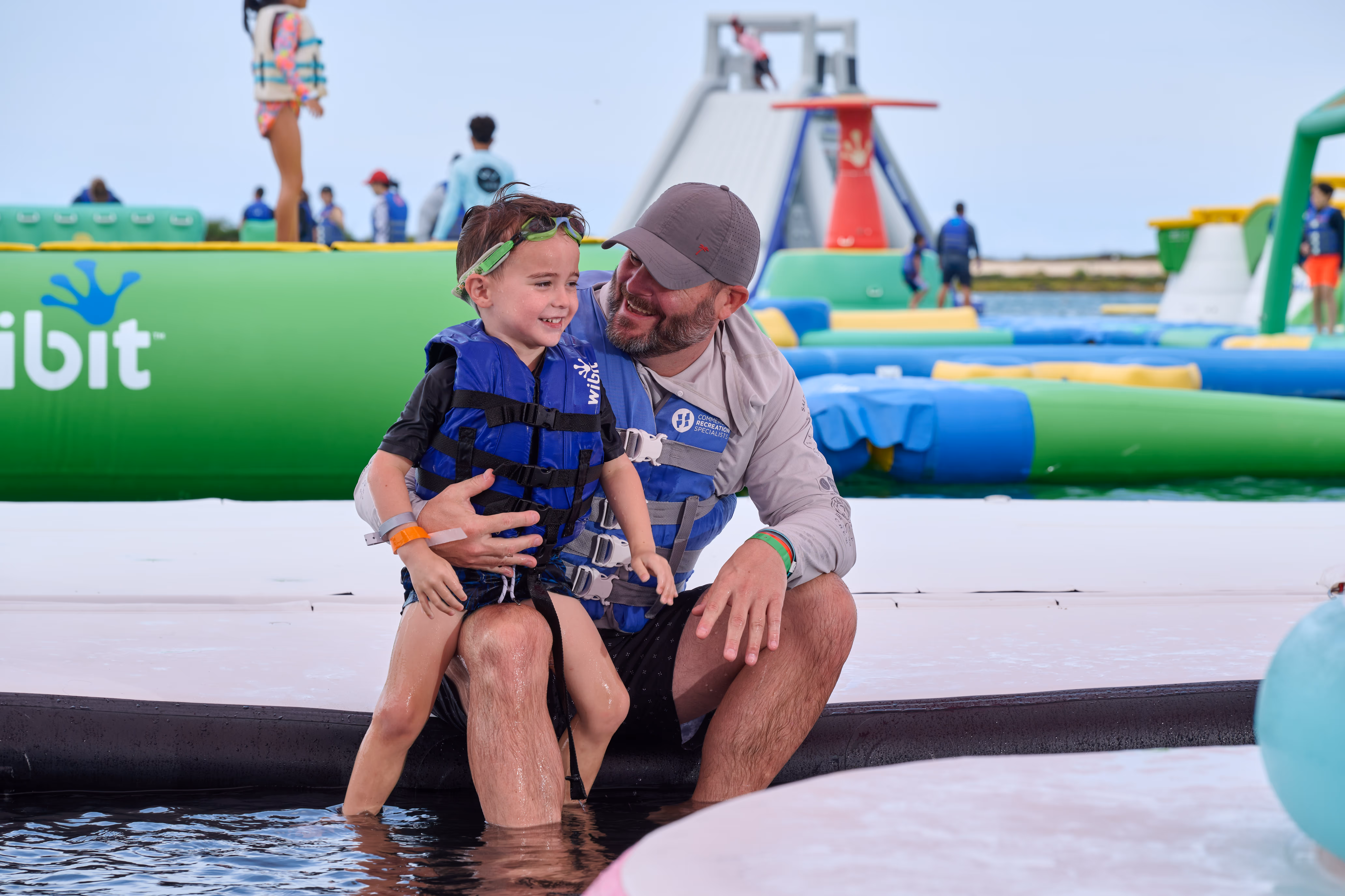 Families using the Wai Kai Ohana Splash Pad.