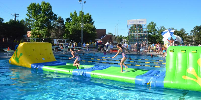 Inflatable water play feature at William L. Welch Community Pool.