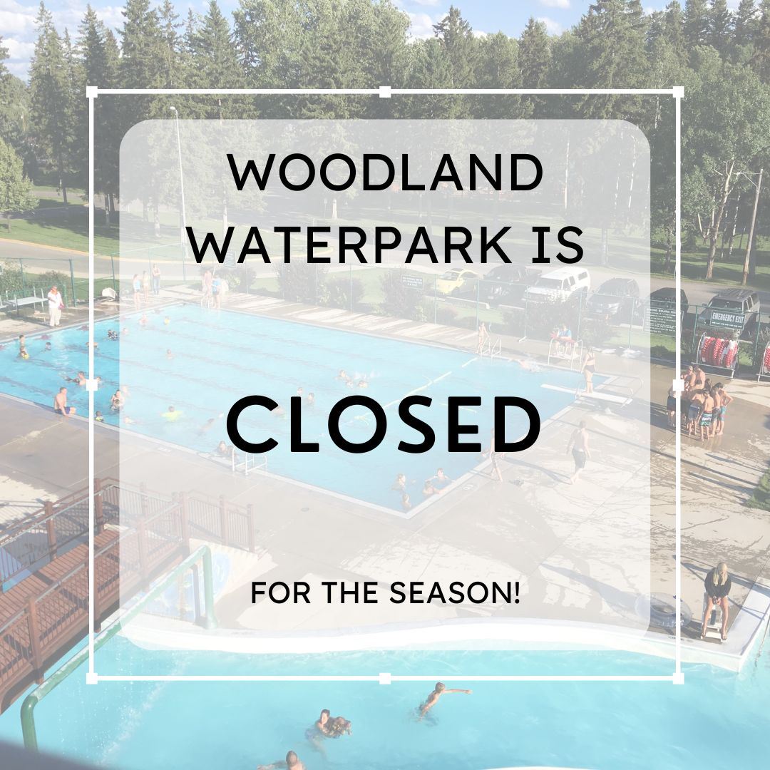 Woodland Water Park seasonal closure sign with water park image.